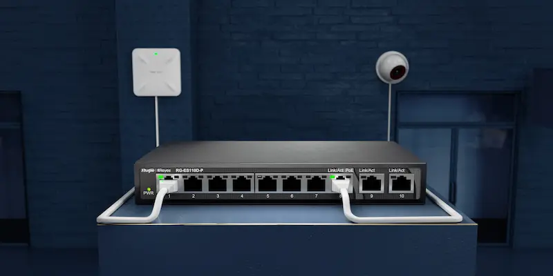 Image du RG‑ES110D‑P, switch compact 8 ports 10/100 Mbps, boîtier sans ventilateur, design discret.