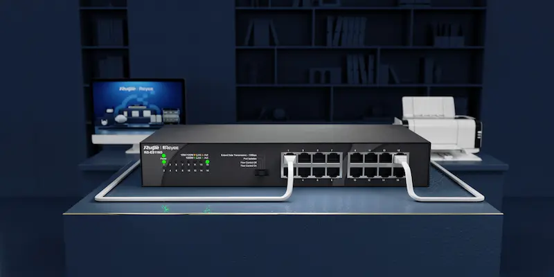 Image du switch RG‑ES116G, boîtier compact et fanless, 16 ports RJ‑45 10/100 Mbps, orientation murale ou bureau.
